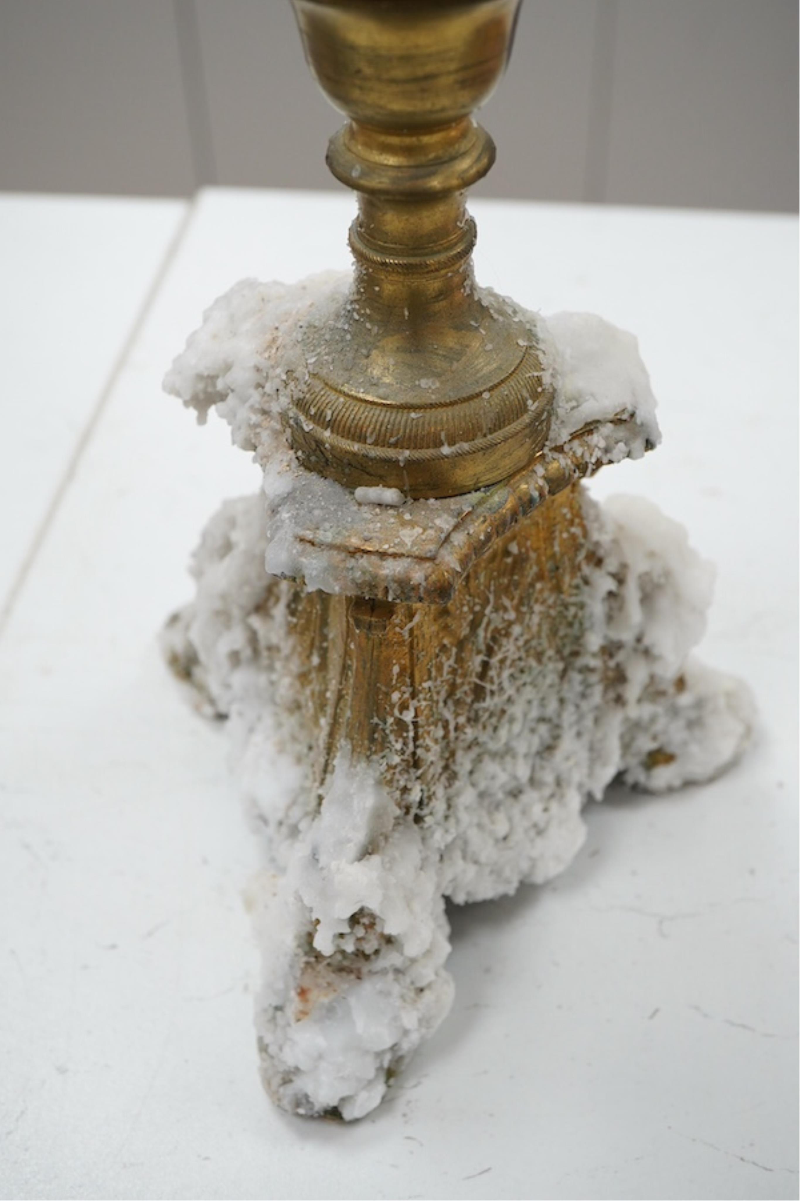 A brass column candlestick, 73cm